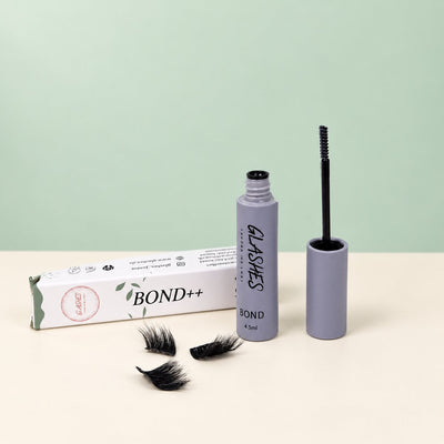 Glashes Bond++ Wimpernkleber in grauer Tube mit Applikator und Verpackung