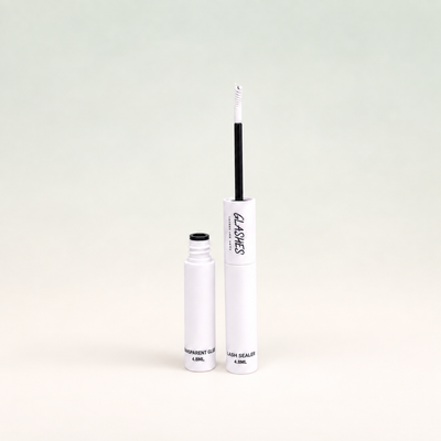 Glashes transparenter Wimpernkleber und schwarzer Sealer